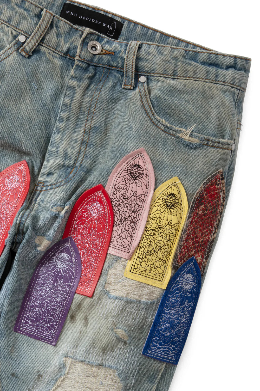 WHO DECIDES WAR PATCH ARCHED REPAIRED DISTRESSED DENIM
